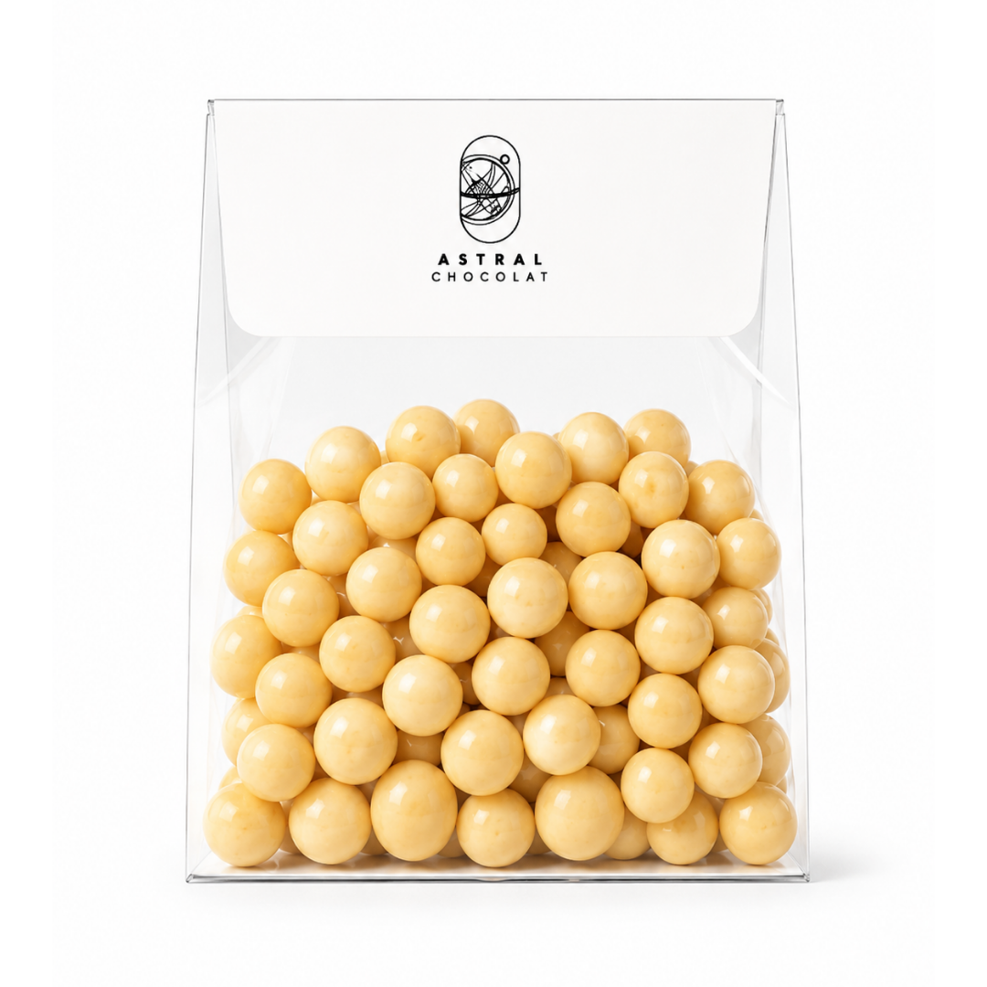 Mini billes soufflées enrobées de Chocolat Blanc Mangue