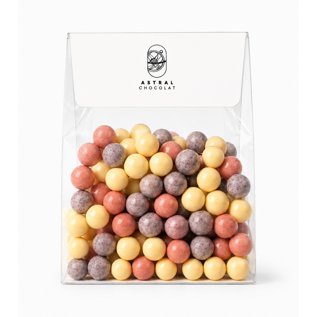 Mini billes soufflées enrobées de Chocolat Blanc et de saveurs fruitées